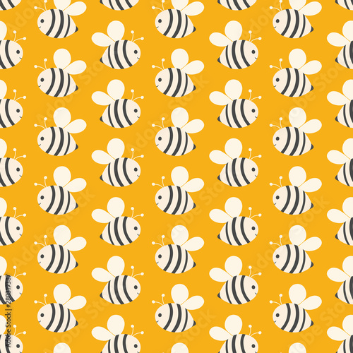 Seamless geometric repeat of bees on a yellow background. A sweet hand drawn vector pollinator design ideal for children.