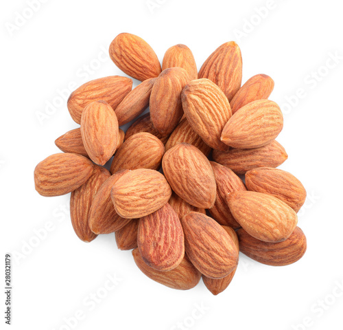 Organic dried apricot kernels on white background, top view