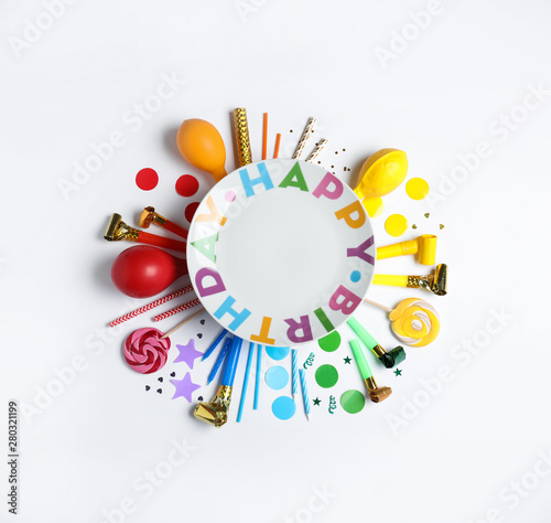 Composition with birthday party items on white background, top view. Space for text