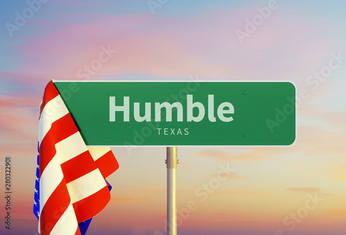 Humble – Texas. Road or Town Sign. Flag of the united states. Sunset oder Sunrise Sky. 3d rendering photo