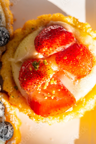 Vászonkép A delicious piece of fine cake with fruits on top