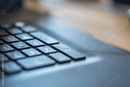 Εκτύπωση καμβά A laptop on a dirty work surface in the industry