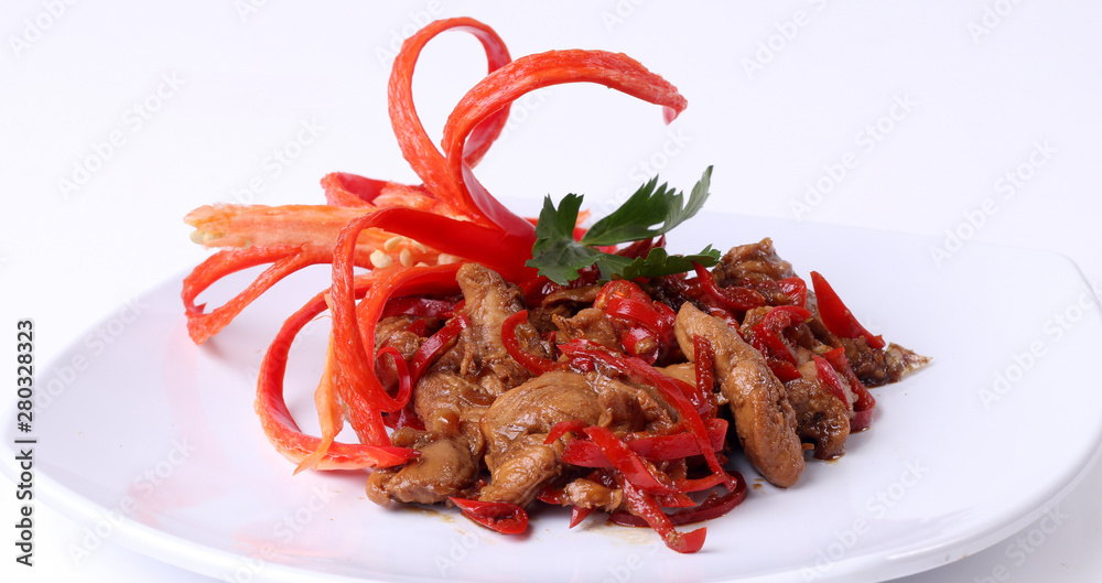 Vegetarian food delicious stir fry oyster mushrooms with red chili on white plate Vegetarian food delicious stir fry oyster mushrooms with red chili on white plate