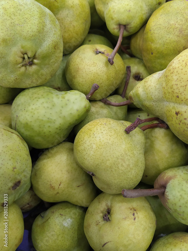 Macro Photo food fruit green pears. Texture background of fresh green pears. Limited depth of field.