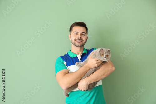 Young man with cute funny c...