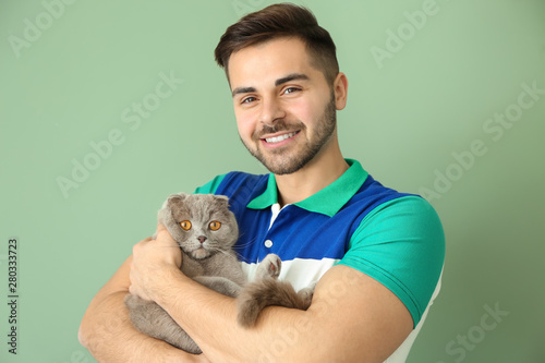 Young man with cute funny c...