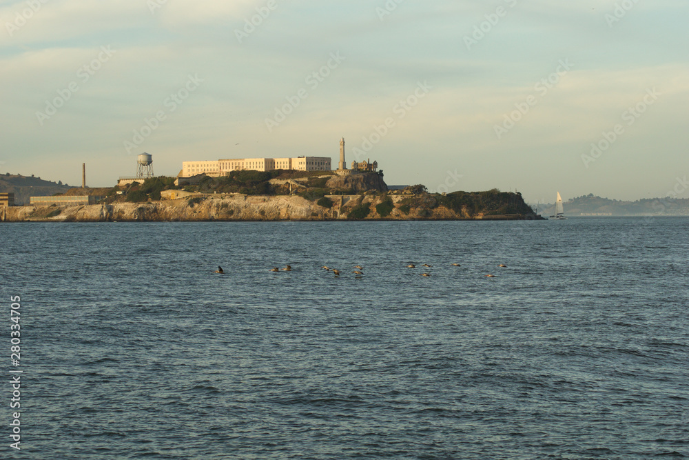 SAN FRANCISCO, CALIFORNIA, UNITED STATES - NOV 25th, 2018: Alcatraz Island with famous prison building during sunny day