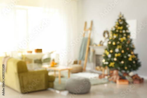 Blurred view of beautiful living room decorated for Christmas
