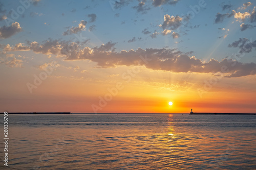 Magnificent sunset over the sea with clouds.