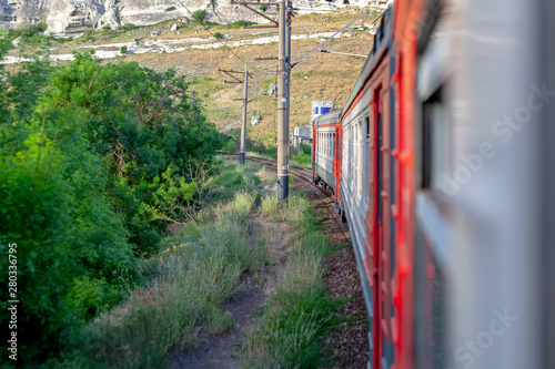 View from the window of a moving train.
