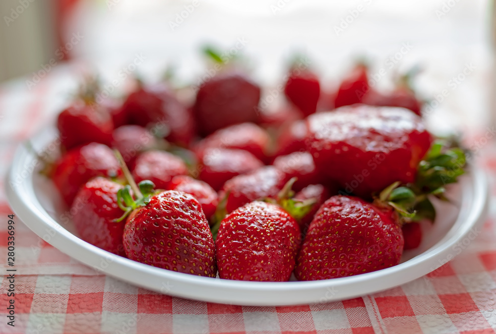 Ripe strawberries with a solid background and close-up. Ripe strawberries with a solid background and close-up.