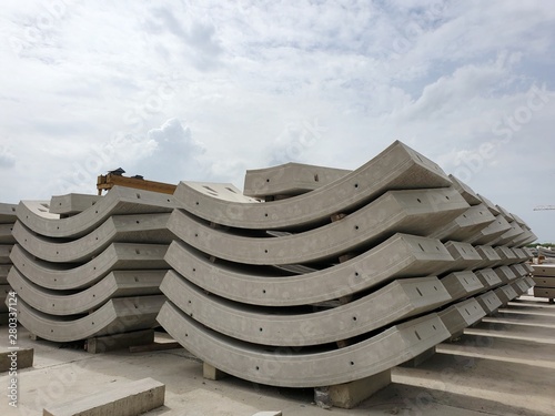 Precast concrete plant with blue sky in the construction site, in storage yard area at Thailand, Space for text in template, Concrete Tunnel Segments