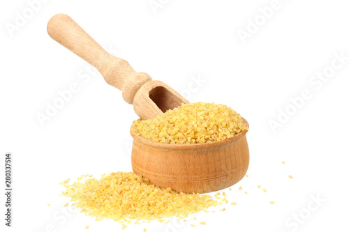 dry bulgur wheat in wooden bowl isolated on white background