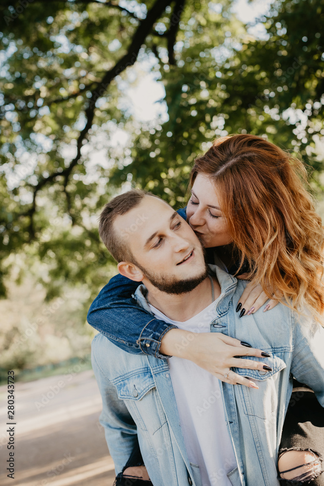 Happy loving couple outdoor in park . Happy loving couple outdoor in park .