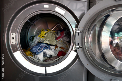Washed clothes inside a spin dryer