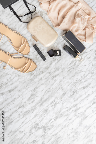 Fashion and Beauty blog concept. Elegant Woman accessories, clothing, shoes, bag, makeup and perfume white grey background. Blogging flat lay.