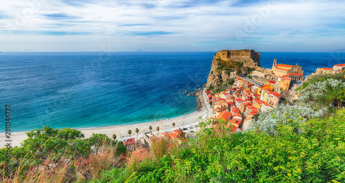 Fototapeta Naklejka Na Ścianę i Meble -  Beautiful seaside town village Scilla with old medieval castle on rock Castello Ruffo