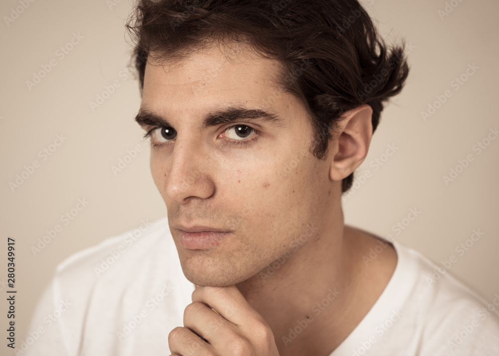 Portrait of young handsome man posing happy for the camera. Beauty concept and lifestyle Portrait of young handsome man posing happy for the camera. Beauty concept and lifestyle
