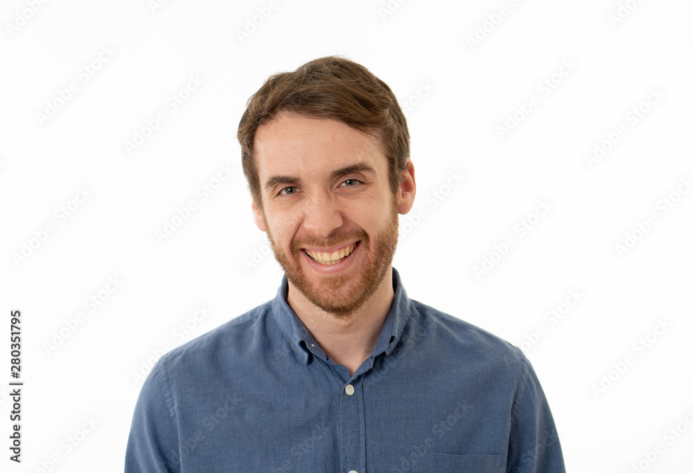 Portrait of attractive cheerful young man with smiling happy face. Human expressions and emotions Portrait of attractive cheerful young man with smiling happy face. Human expressions and emotions