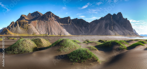 Fototapeta Naklejka Na Ścianę i Meble -  Fantastic sunny day and gorgeous black sand dunes on Stokksnes cape in Iceland.