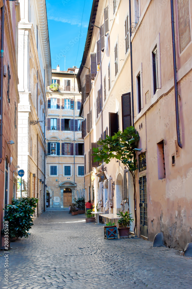 Narrow solitary street in the city center of Rome