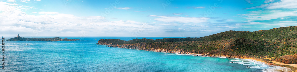 Fantastic view of Capo Carbonara beach with turquoise water and lighthouse Fantastic view of Capo Carbonara beach with turquoise water and lighthouse