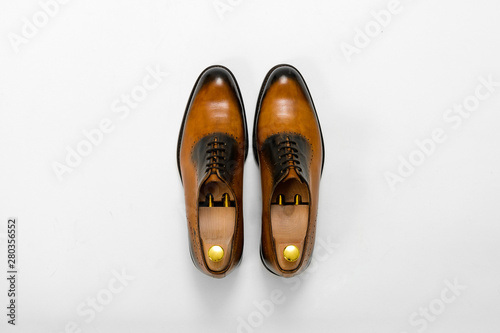Classic male leather shoes. Isolated on white background. Top view