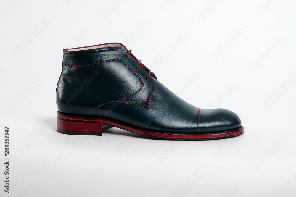 Classic male leather shoes. Isolated on white background. Side view Classic male leather shoes. Isolated on white background. Side view