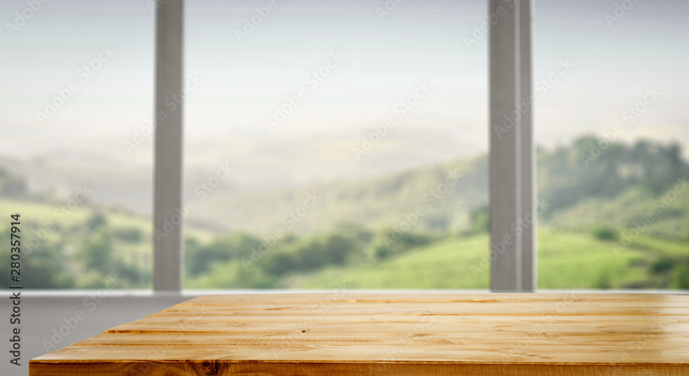Desk of free space and blurred background of window Desk of free space and blurred background of window