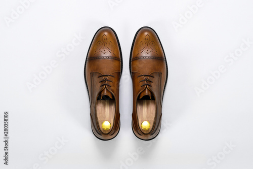 Classic male leather shoes. Isolated on white background. Top view