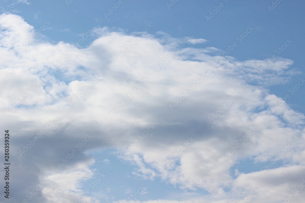 Beautiful clouds floating on the vast blue of the sky Beautiful clouds floating on the vast blue of the sky