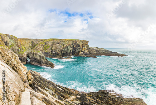 Rough cliff line at Mizen head lighthouse in southern west Ireland