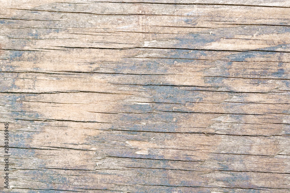 A brown-black wood style wall background and texture. A brown-black wood style wall background and texture.