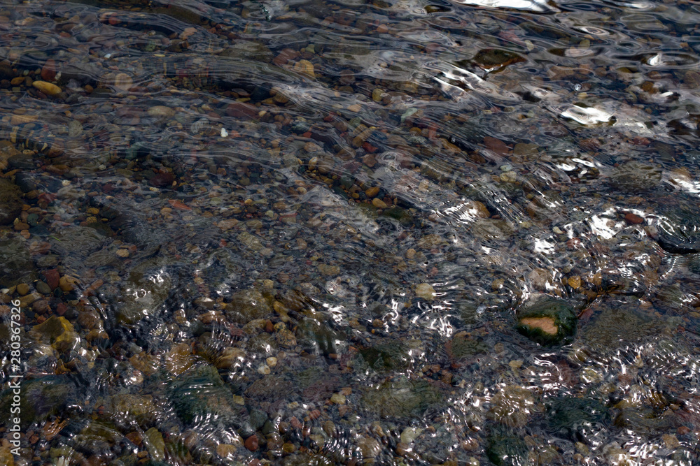 The texture of water. Dark fine waves The texture of water. Dark fine waves