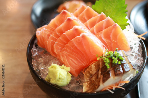 Salmon Sashimi served on ice in reataurant