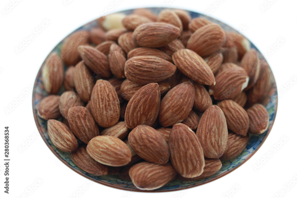 almonds in a porcelain almonds in a porcelain