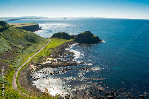 Giants Causeway Aerial view most popular and famous attraction in Northern Ireland.Hills on Coast of Atlantic ocean, summer time 