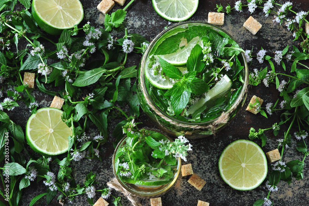 Homemade cold mojito. Leaves of mint, lime, brown sugar. Flat Lay.