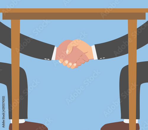 Businessman shaking hands under the table