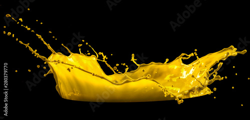 yellow paint splash isolated on black background