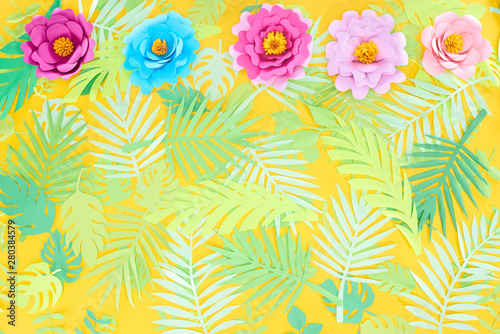 Fototapeta Naklejka Na Ścianę i Meble -  flat lay with paper cut multicolored flowers on tropical leaves on yellow bright background with copy space