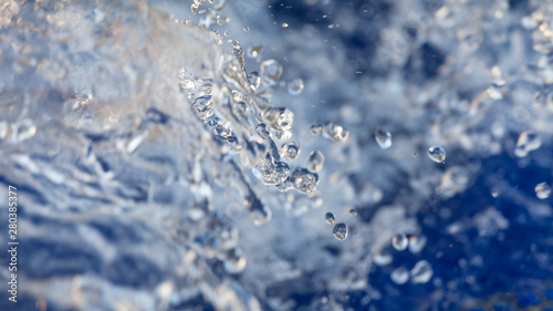 Water splash in a fountain, close up, macro © Freelancer