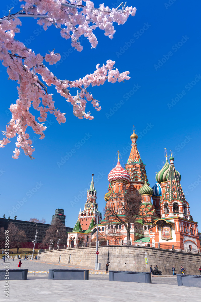 St. Basil's Cathedral and Kremlin Walls in sunny sky. Red square is Attractions popular's touris in Moscow, Russia