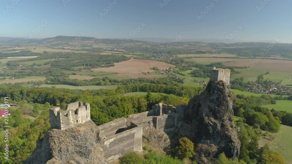 Ruins of Gothic castle Trosky in National Park Czech Paradise. Aerial view to medieval monument in Czech Republic. Ruins of Gothic castle Trosky in National Park Czech Paradise. Aerial view to medieval monument in Czech Republic.