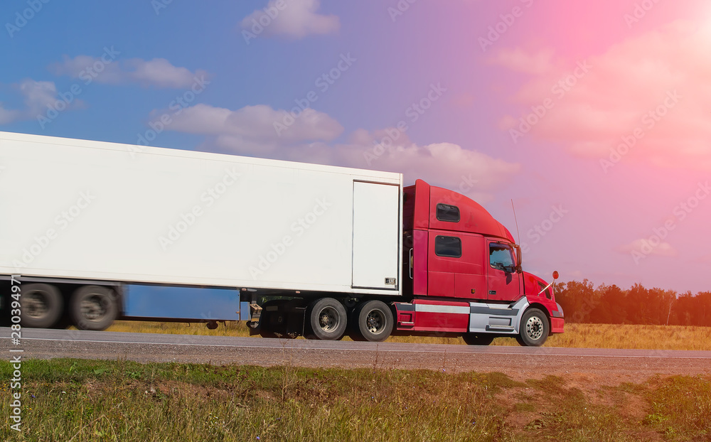 Large semi-trailer moves on a country road Large semi-trailer moves on a country road