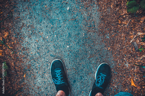 black shoes on natural ground