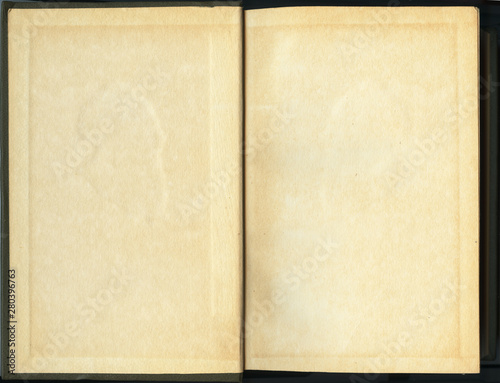 Old brown paper in book. Open book top view. For qoutes, with space for text. High resolution jpg..