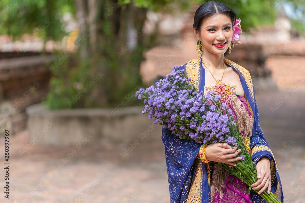 Beautiful young Muslim girl wearing hijab and dress known as Baju Kurung fashion, traditional Muslim dress, hijab, burka, niqab Beautiful young Muslim girl wearing hijab and dress known as Baju Kurung fashion, traditional Muslim dress, hijab, burka, niqab
