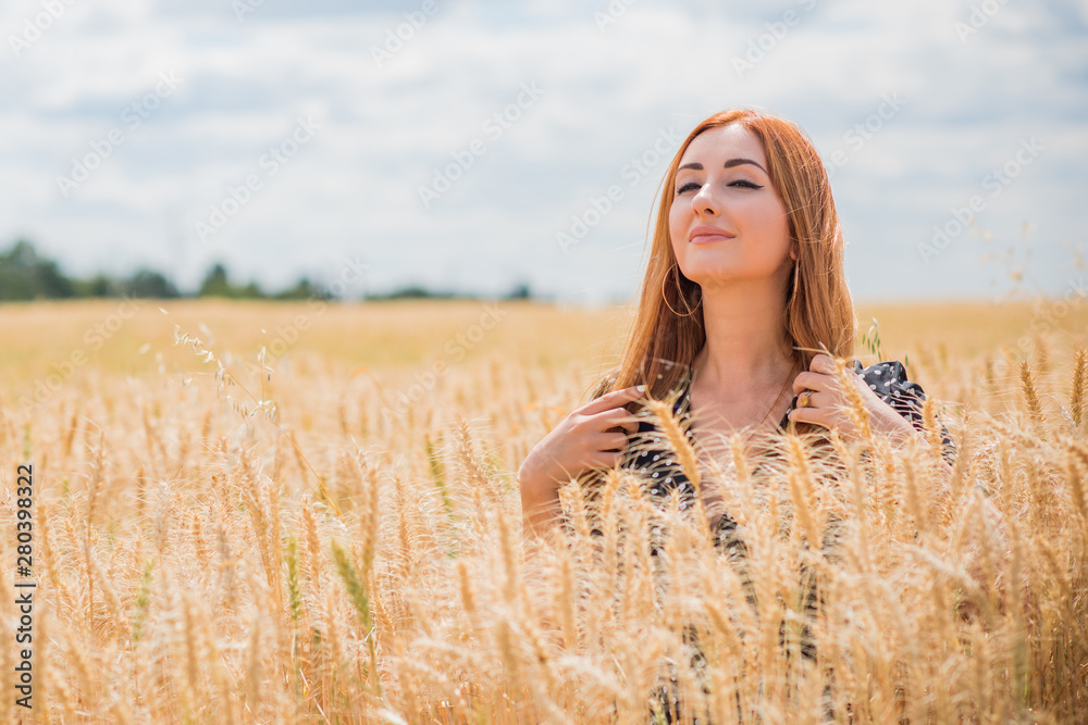 Elegant modern woman's beauty. Portrait of sensual lady in the field Elegant modern woman's beauty. Portrait of sensual lady in the field