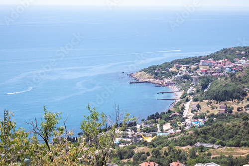 Fototapeta Naklejka Na Ścianę i Meble -  Black Sea view from the mountain. Light sunny summer day, Crimea, Russia.